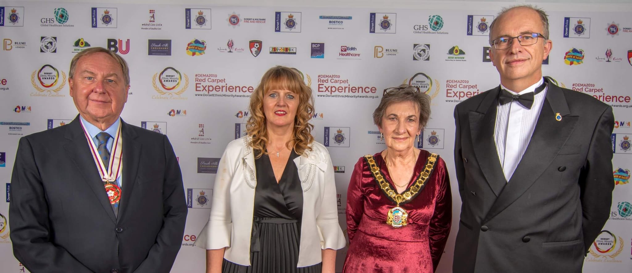 Civic guests, including two mayors wearing their chains of office