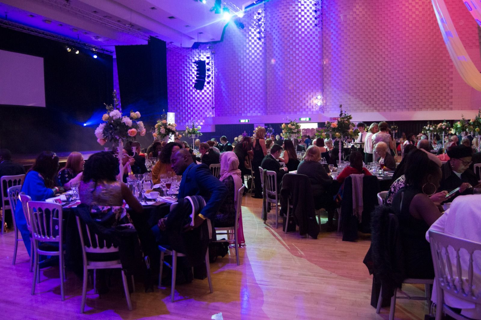 The ballroom lit in purple during the dinner