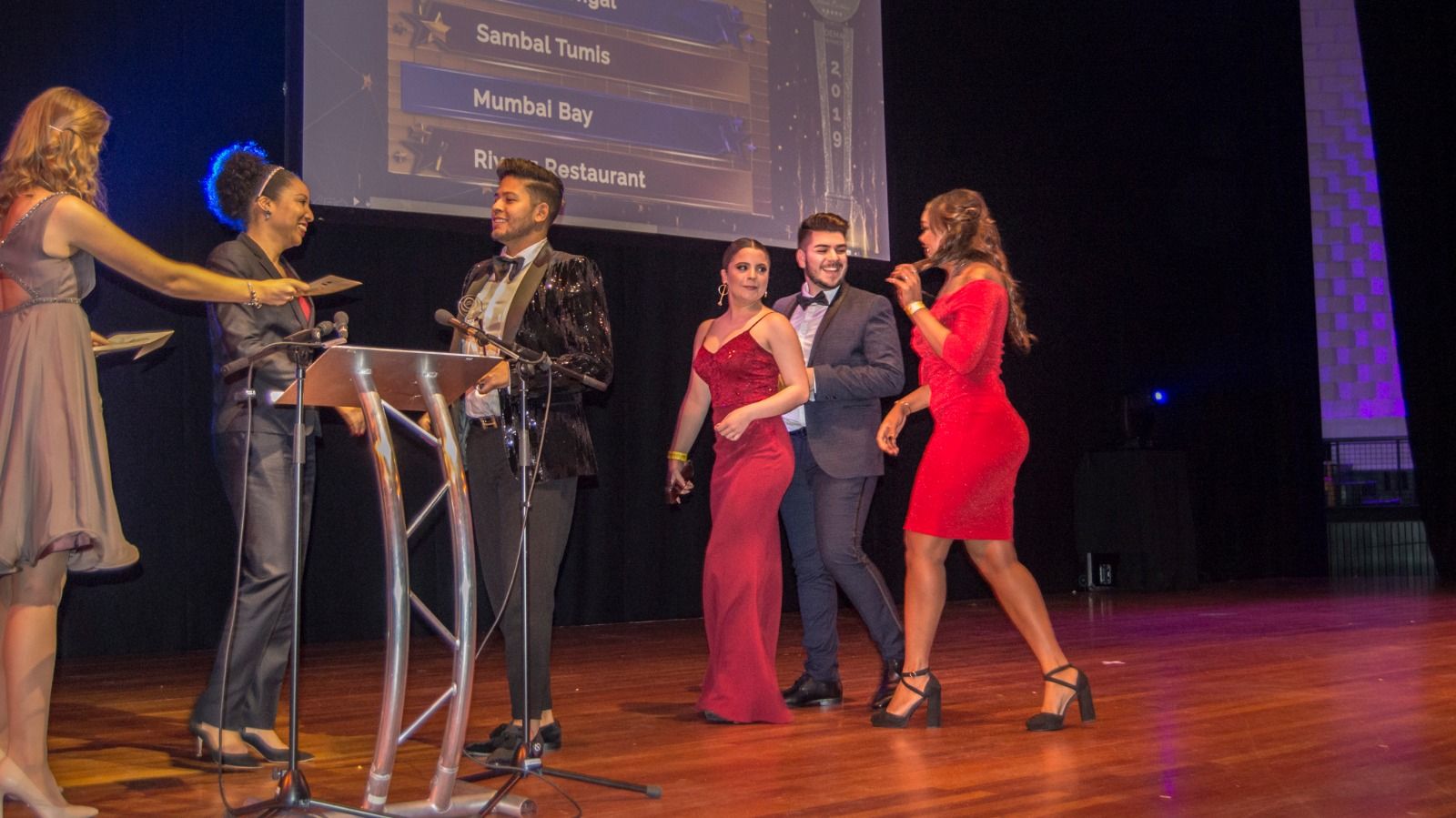 An award being presented on stage