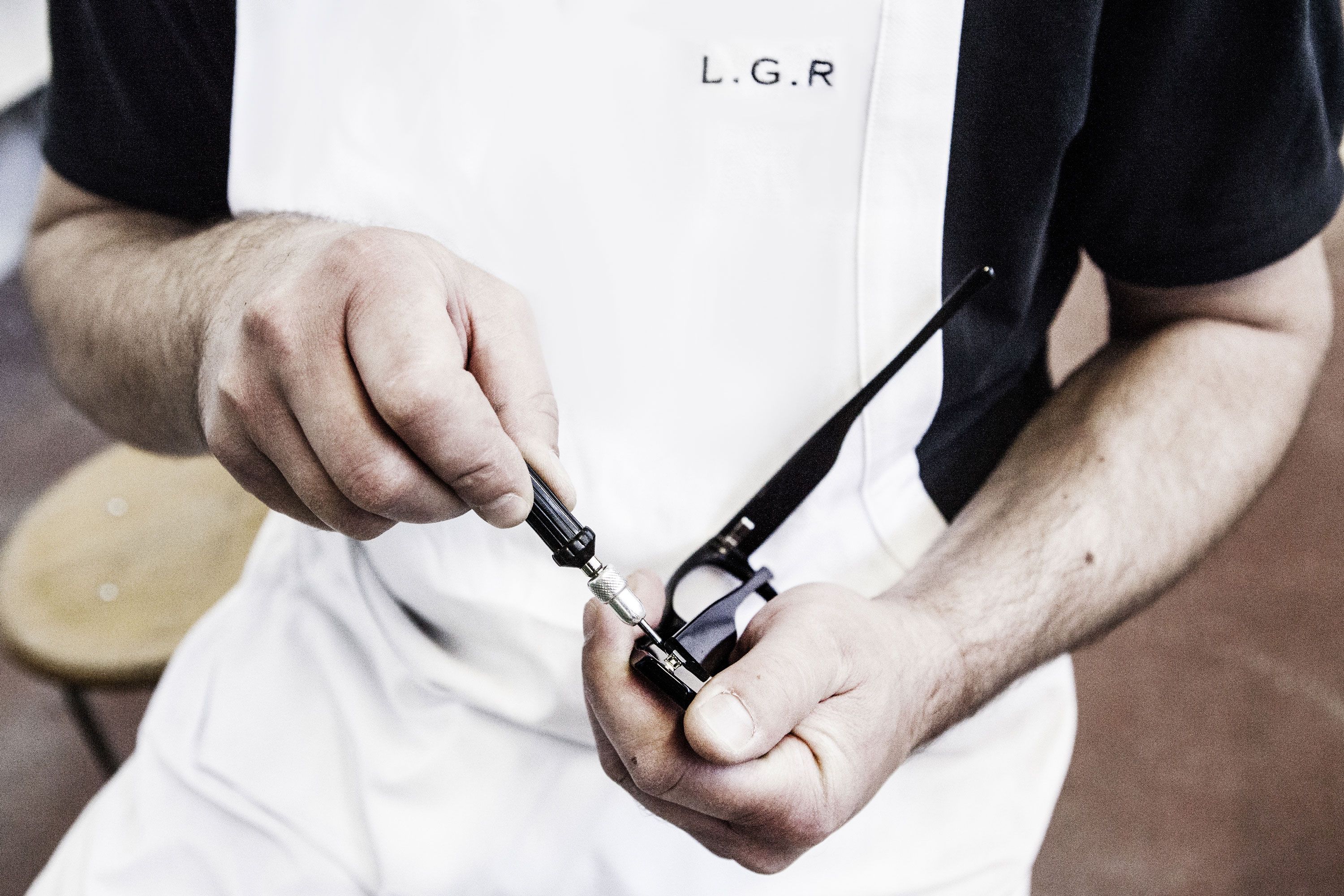 Sunglasses being assembled