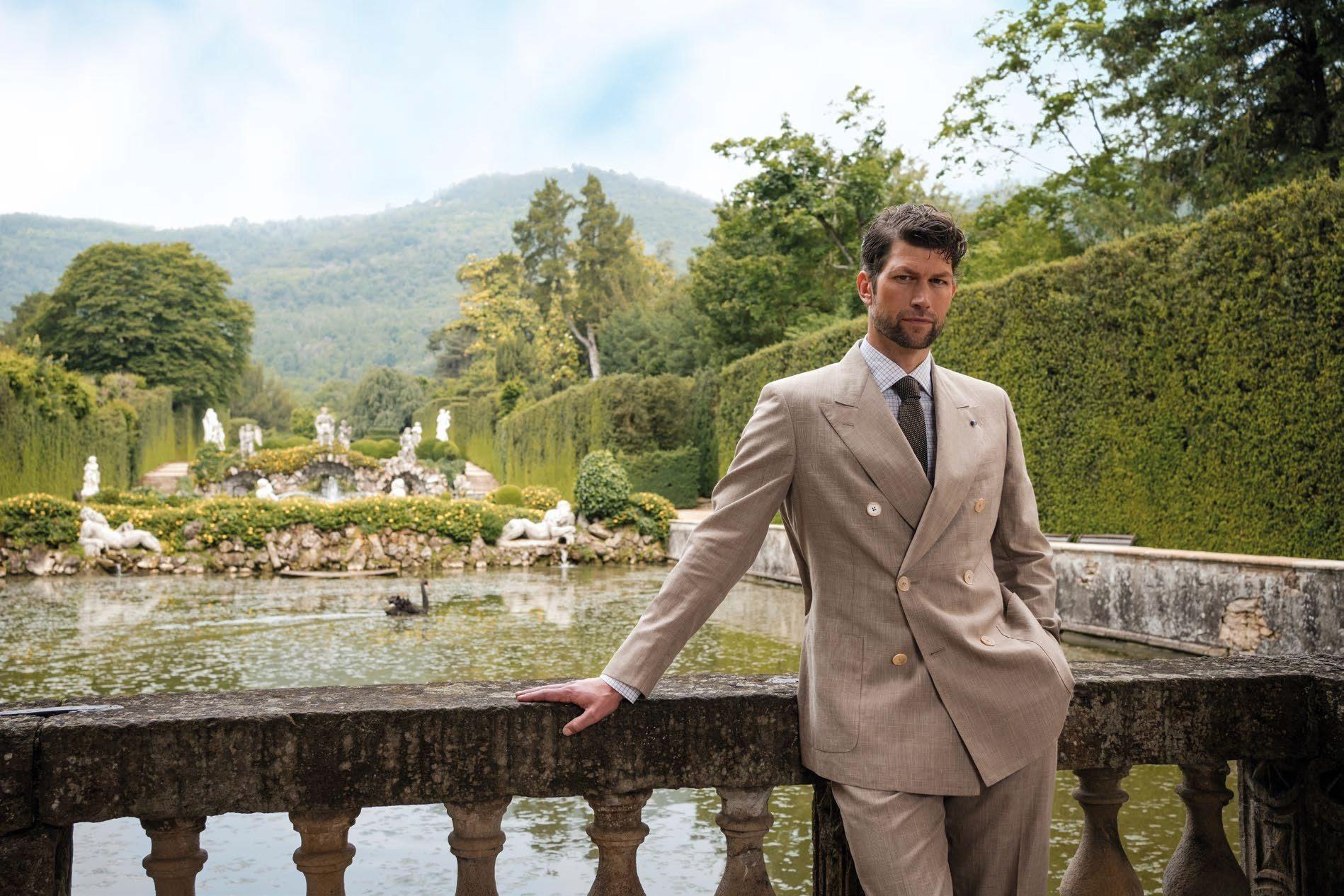 Man in beige suit.