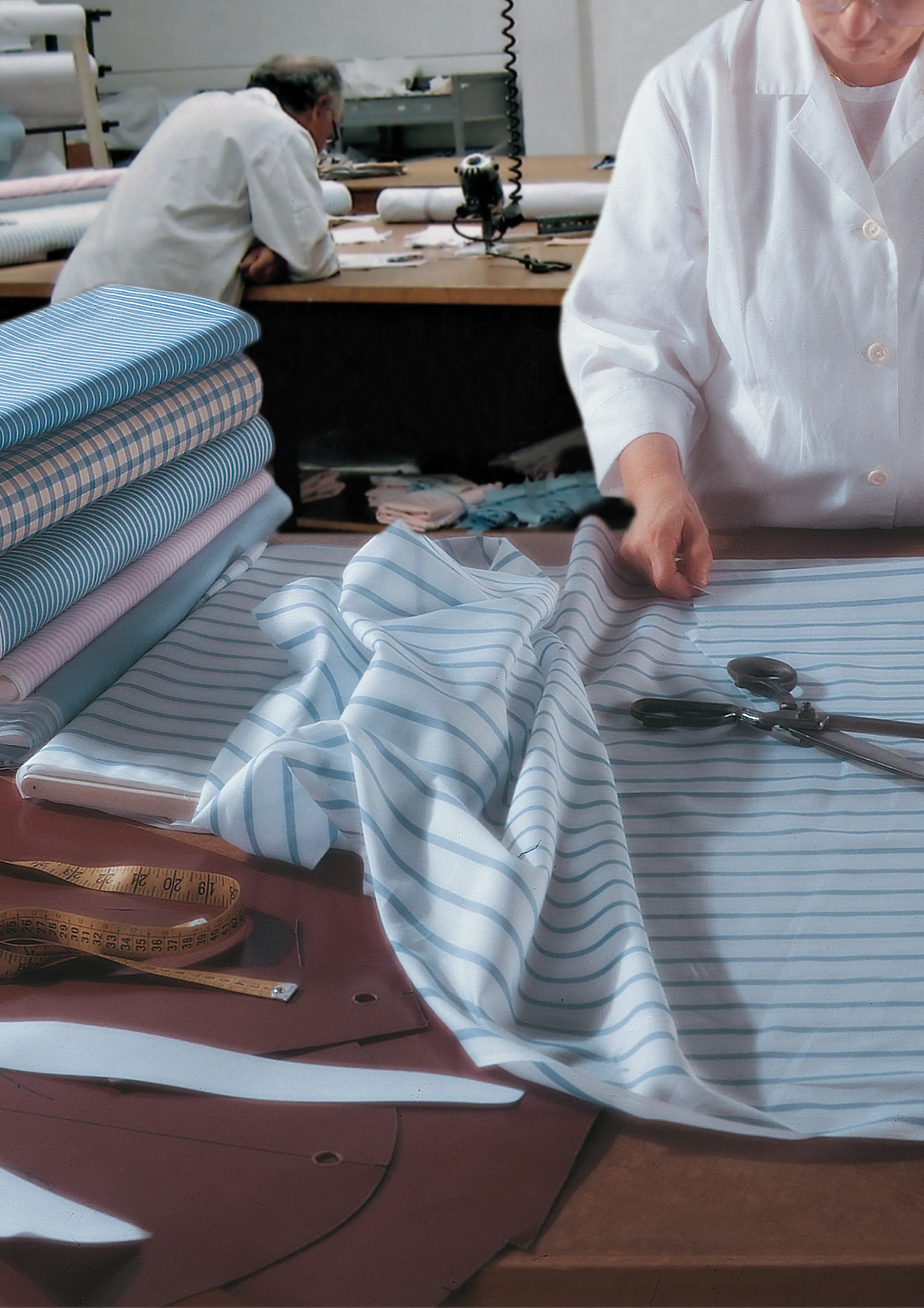 shirt making workshop, pattern being drawn on fabric.