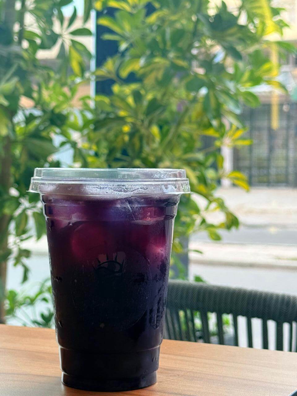 Iced Blueberry Bubble Drink with Popping Boba in Plastic Cup at Asador Coffee El Jadida