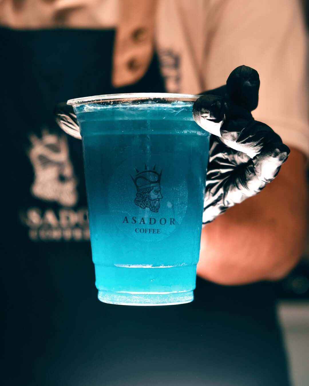 Electric Blue Bubbly Night Drink with Popping Boba in Plastic Cup at Asador Coffee El Jadida