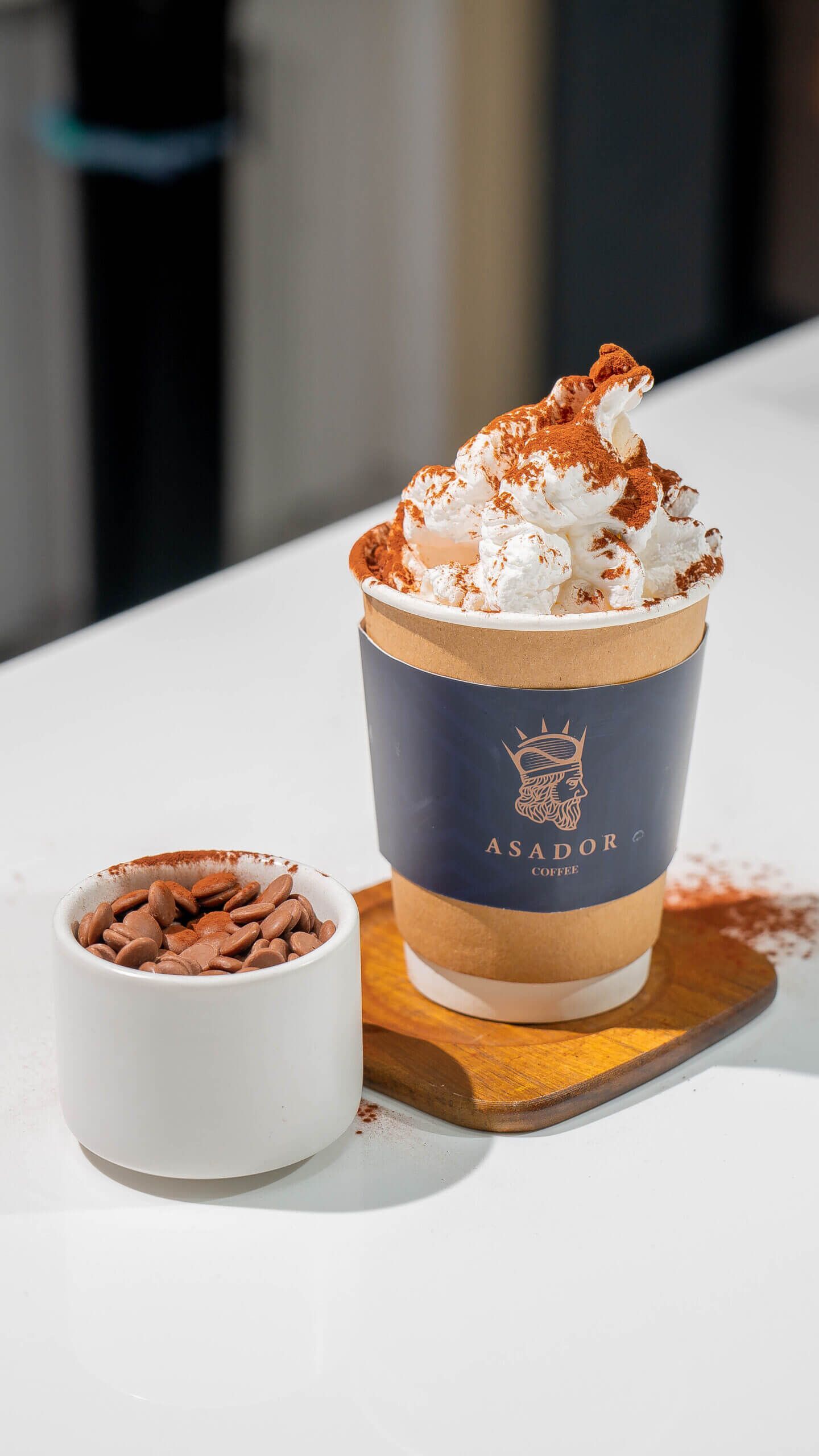 Gourmet Hot Chocolate with Whipped Cream and Real Chocolate Pieces at Asador Coffee El Jadida