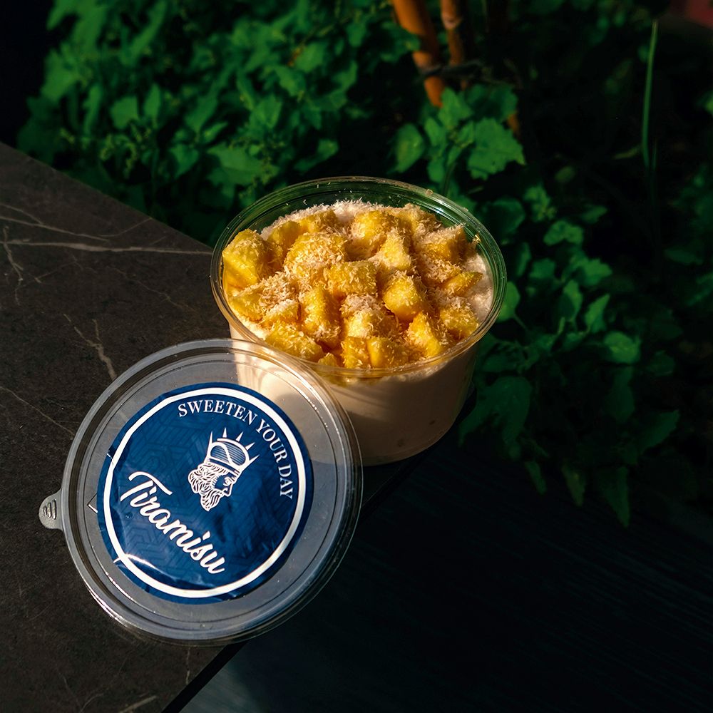 Mango Misu Tiramisu Dessert Cup Topped with Fresh Mango and Coconut at Asador Coffee El Jadida