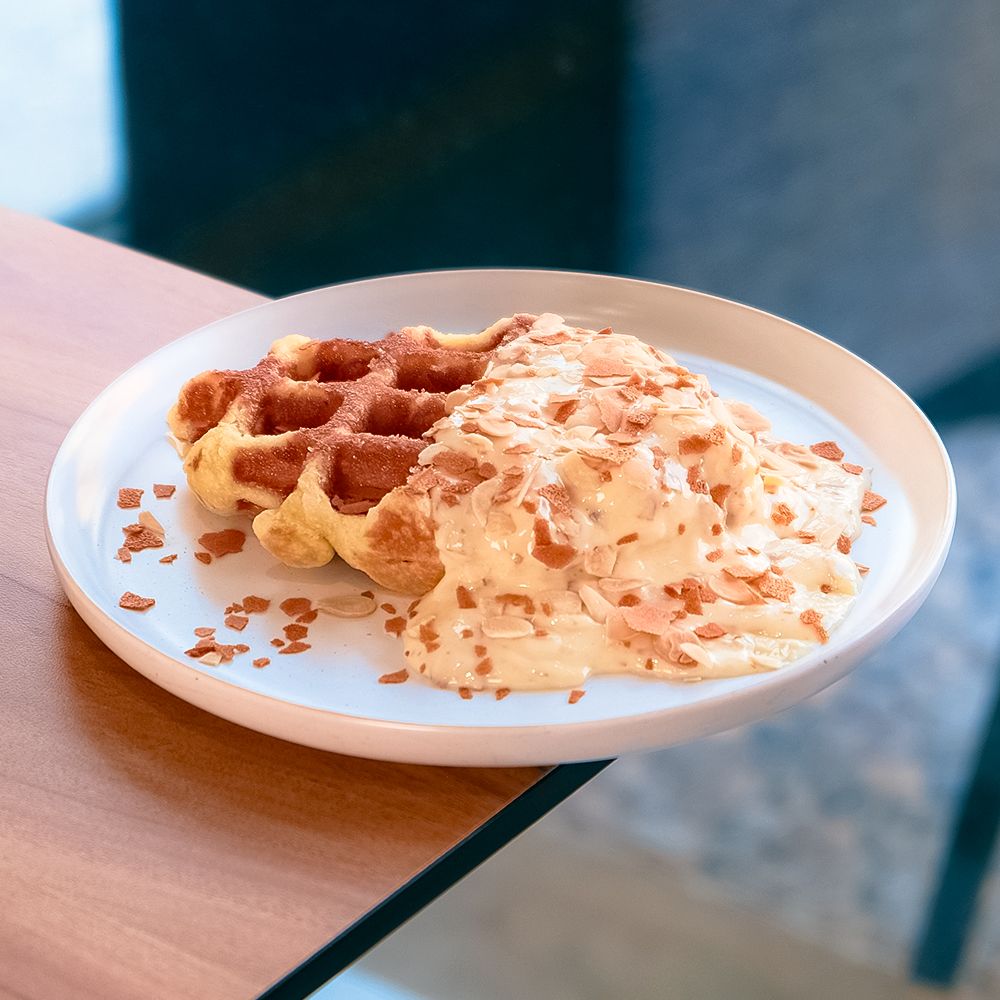 Freshly Baked Raffaello Waffle with White Chocolate and Coconut Cream at Asador Coffee El Jadida