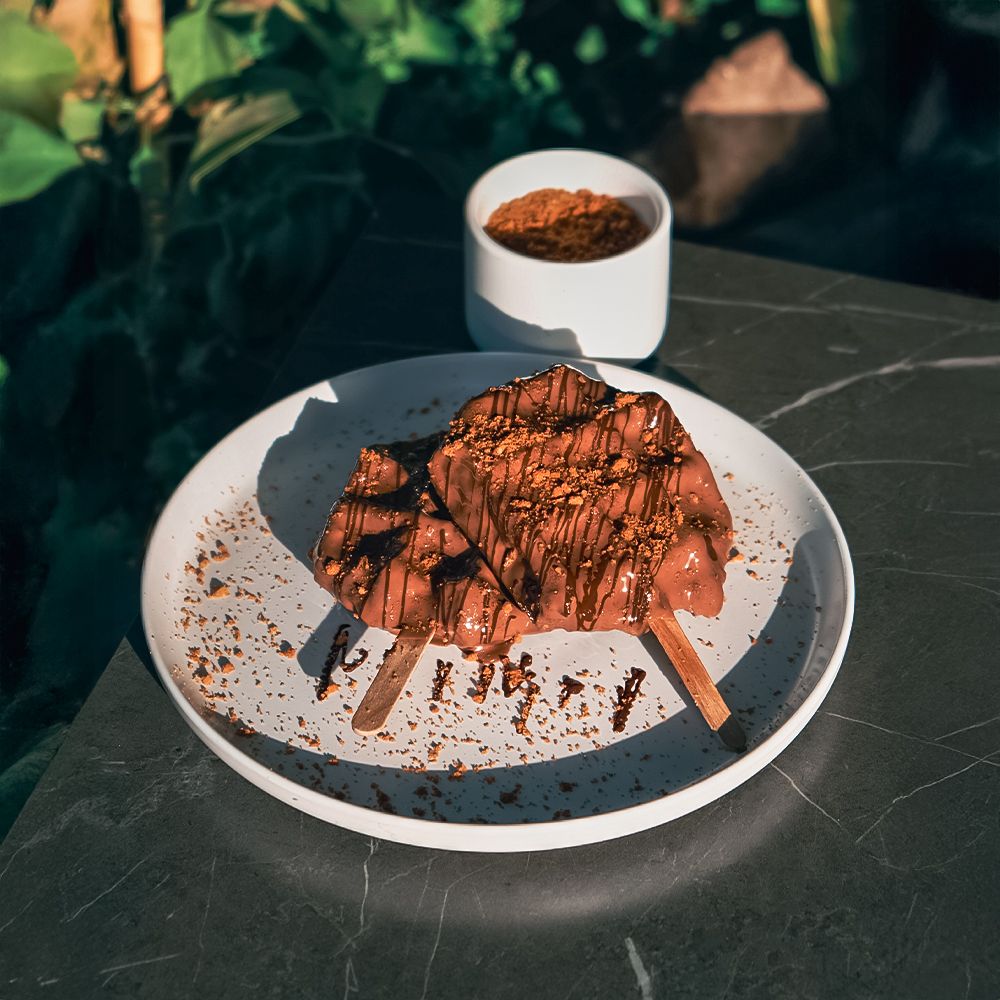 Fresh Milk Waffle Sticks with Creamy Milk Chocolate Drizzle at Asador Coffee El Jadida