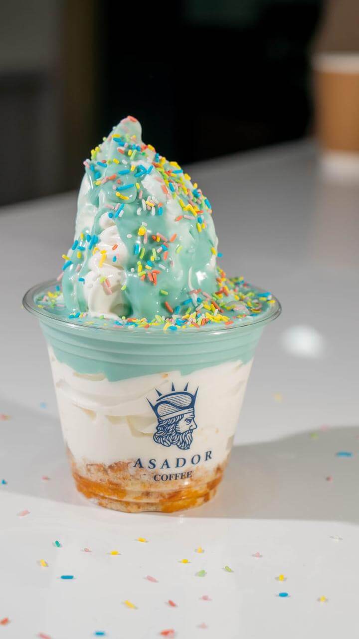 Soft Bubble Gum Ice Cream Swirl with Colorful Rainbow Sprinkles in a Cup at Asador Coffee El Jadida