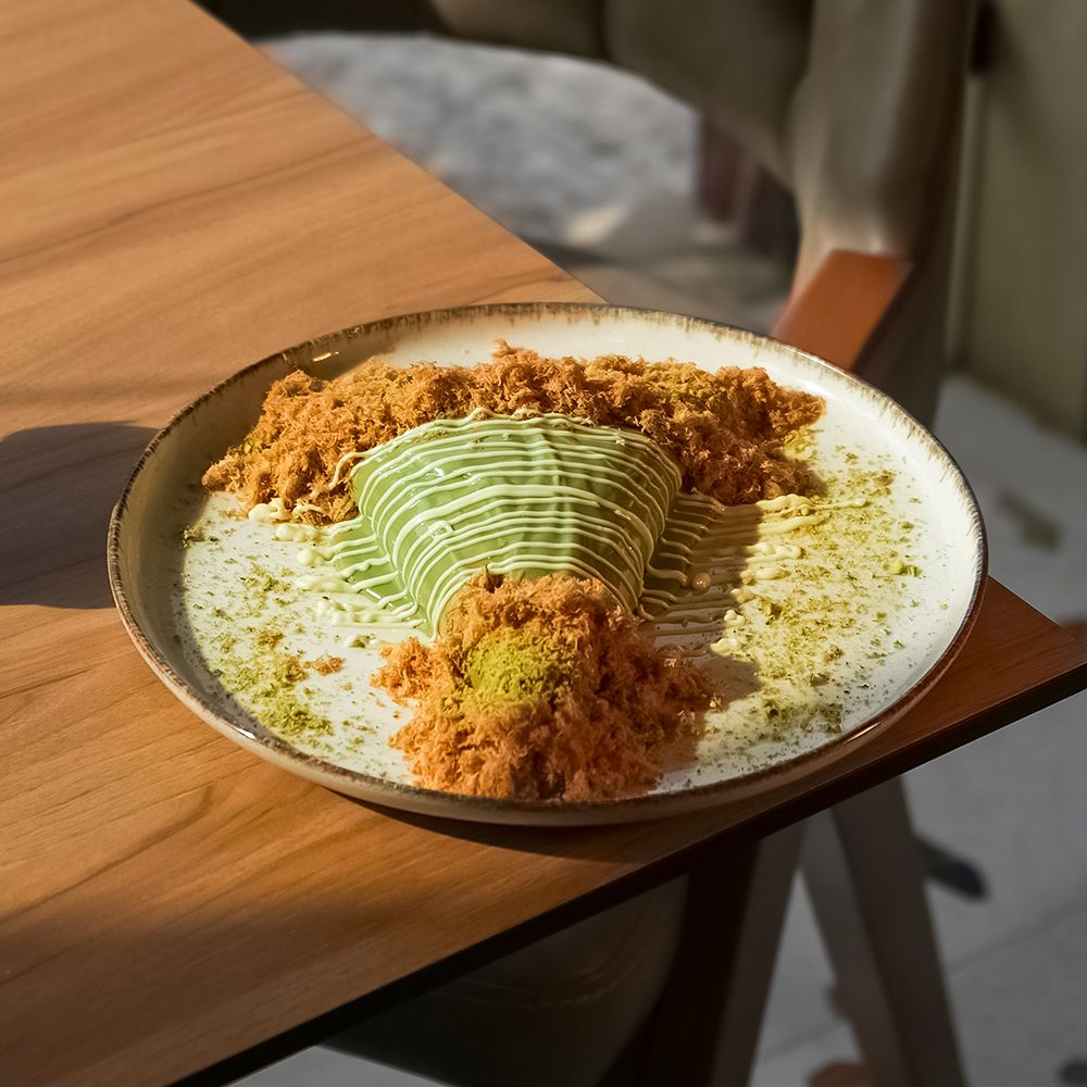Fusion Crepe Kunafa Pistachio with Cream Cheese Filling and Green Pistachio Sauce at Asador Coffee El Jadida