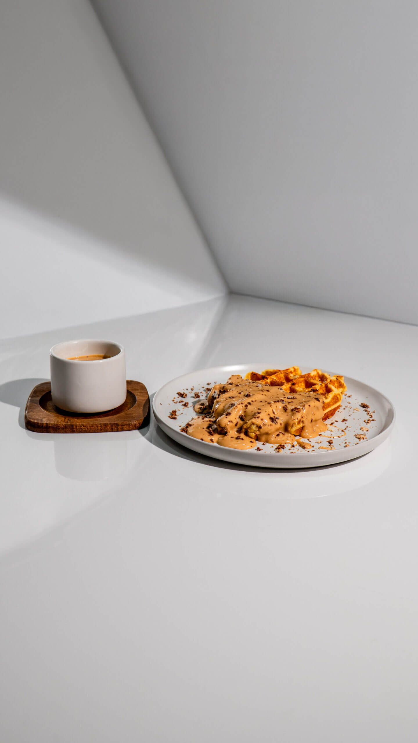 Freshly Baked Bueno Waffle with Hazelnut Cream and Chocolate Drip at Asador Coffee El Jadida