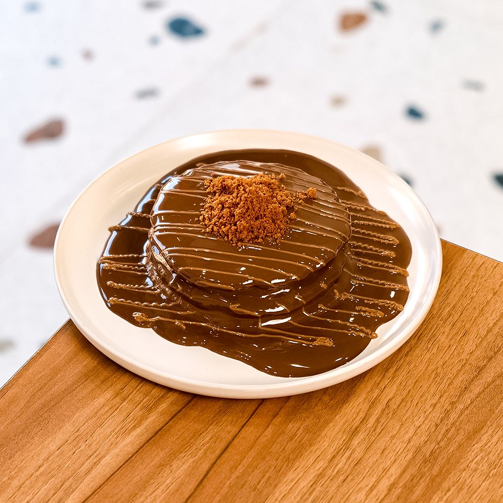 Stack of Fluffy Lotus Pancakes with Biscoff Spread and Cream Cheese at Asador Coffee El Jadida
