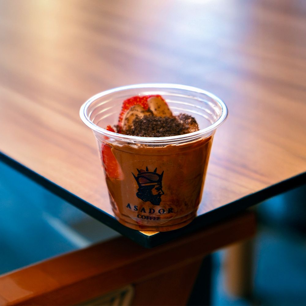 Strawberry Chocolate Dessert Cup with Crushed Oreo Cookie Topping at Asador Coffee El Jadida