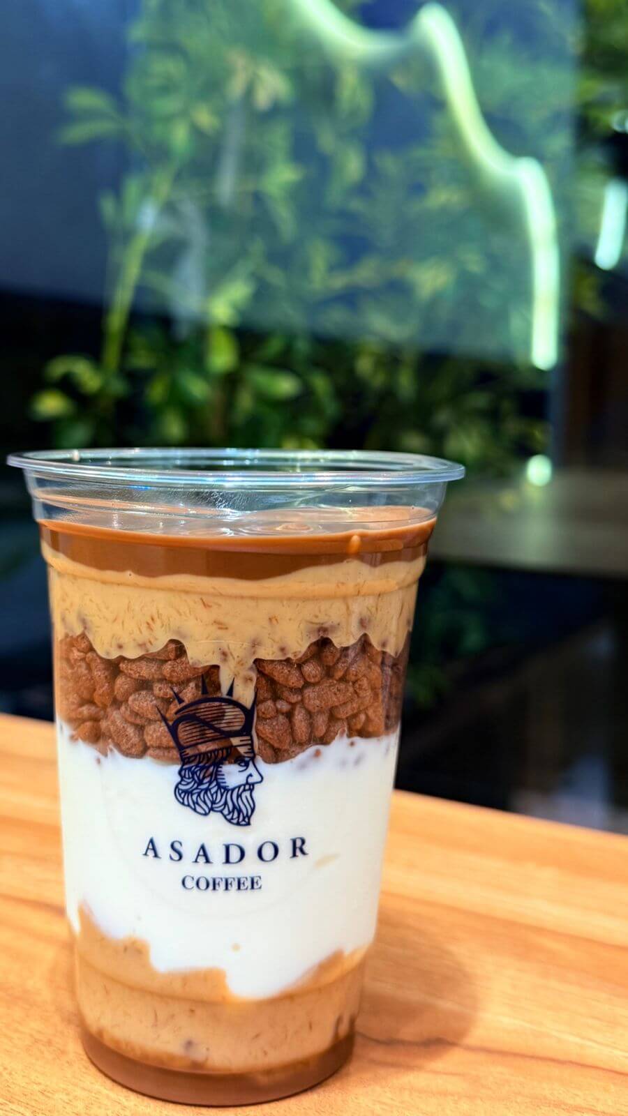 Kinder Bueno Ice Cream Drink with Crispy Rice Topping in Plastic Cup at Asador Coffee El Jadida