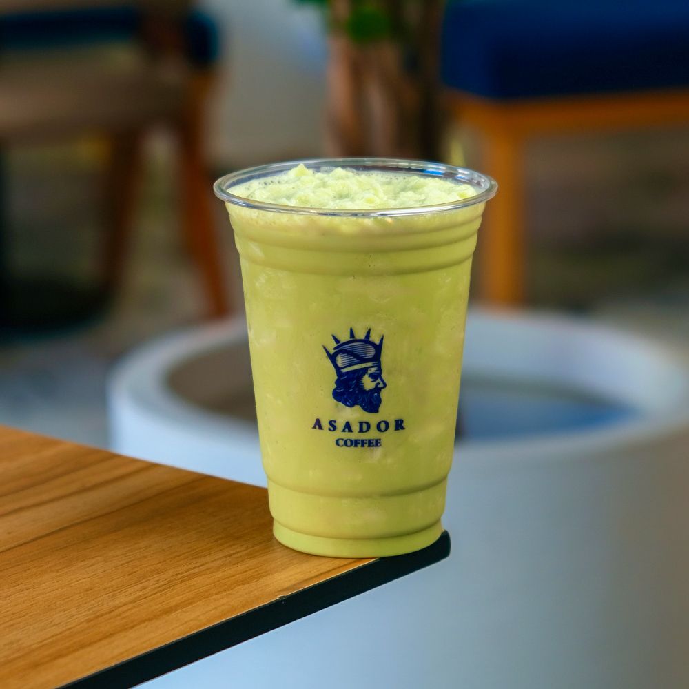 Signature Iced Asador Matcha Latte with Ice Cream in Plastic Cup at Asador Coffee El Jadida
