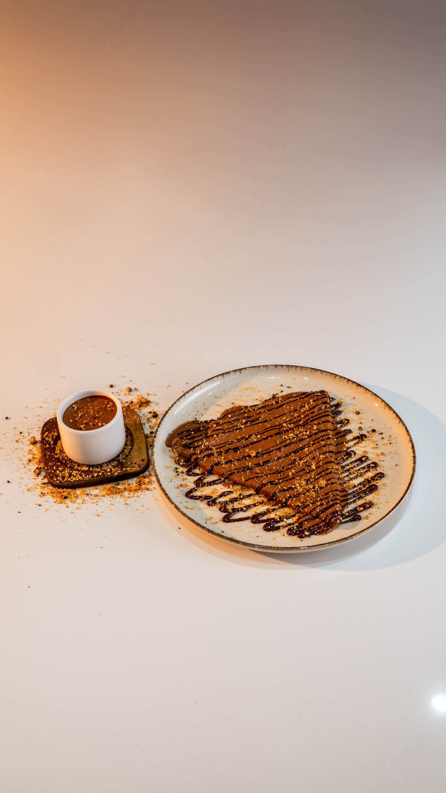 Folded Crepe Chocolate & Cookies with Double Chocolate Drizzle and Cookie Crumbles at Asador Coffee El Jadida