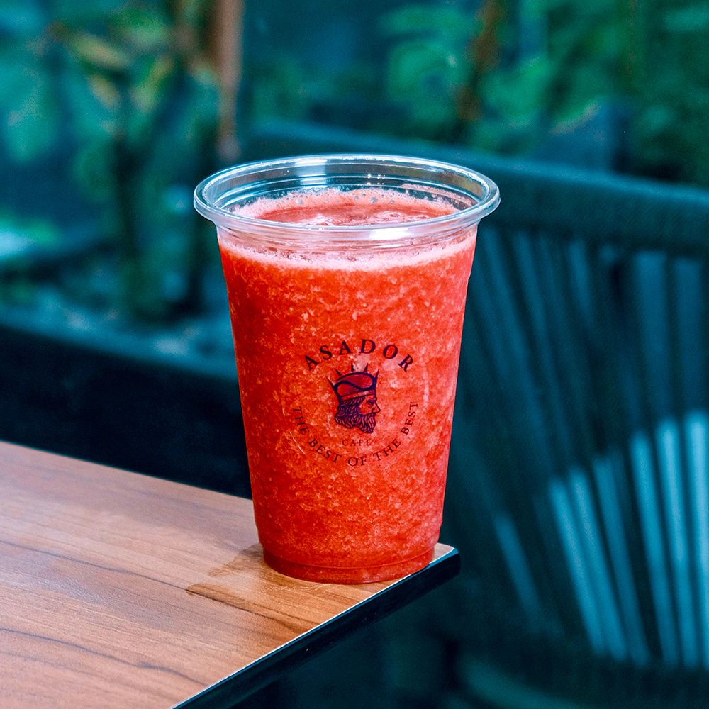 Freshly Blended Strawberry Juice in a Clear Cup at Asador Coffee El Jadida