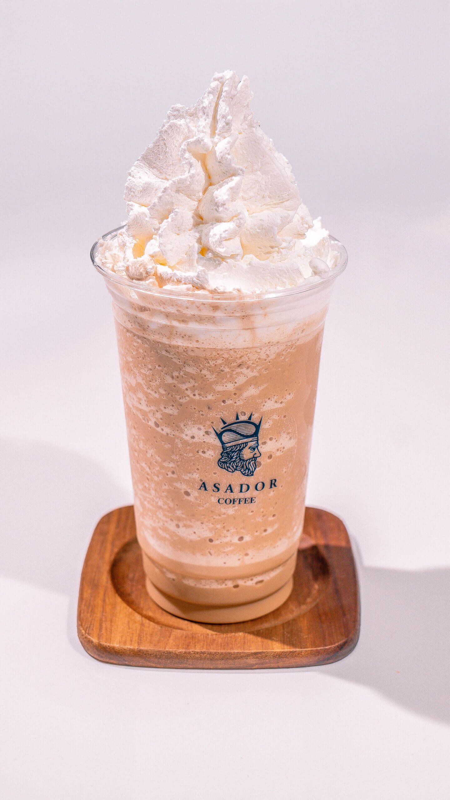 Classic Coffee Frappe with Whipped Cream in Plastic Cup at Asador Coffee El Jadida