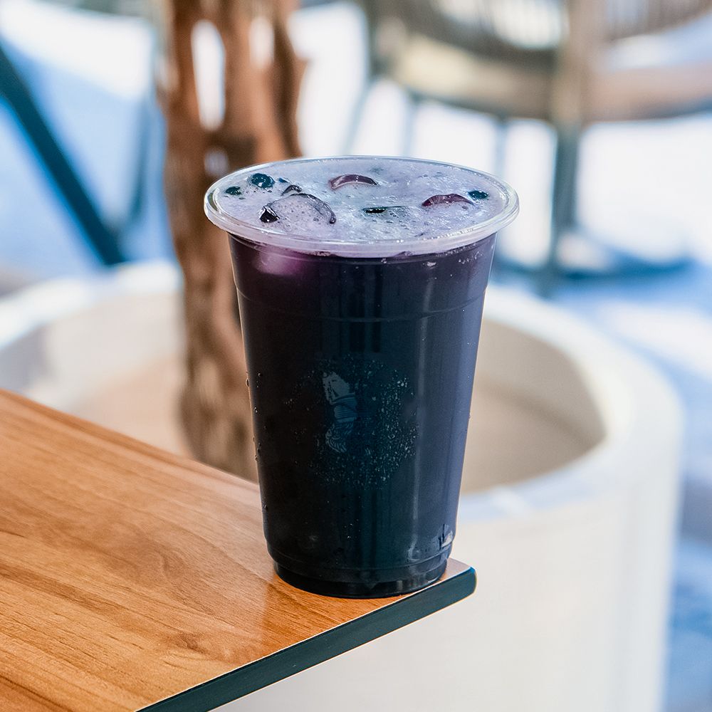 Iced Blueberry Bubble Drink with Popping Boba in Plastic Cup at Asador Coffee El Jadida
