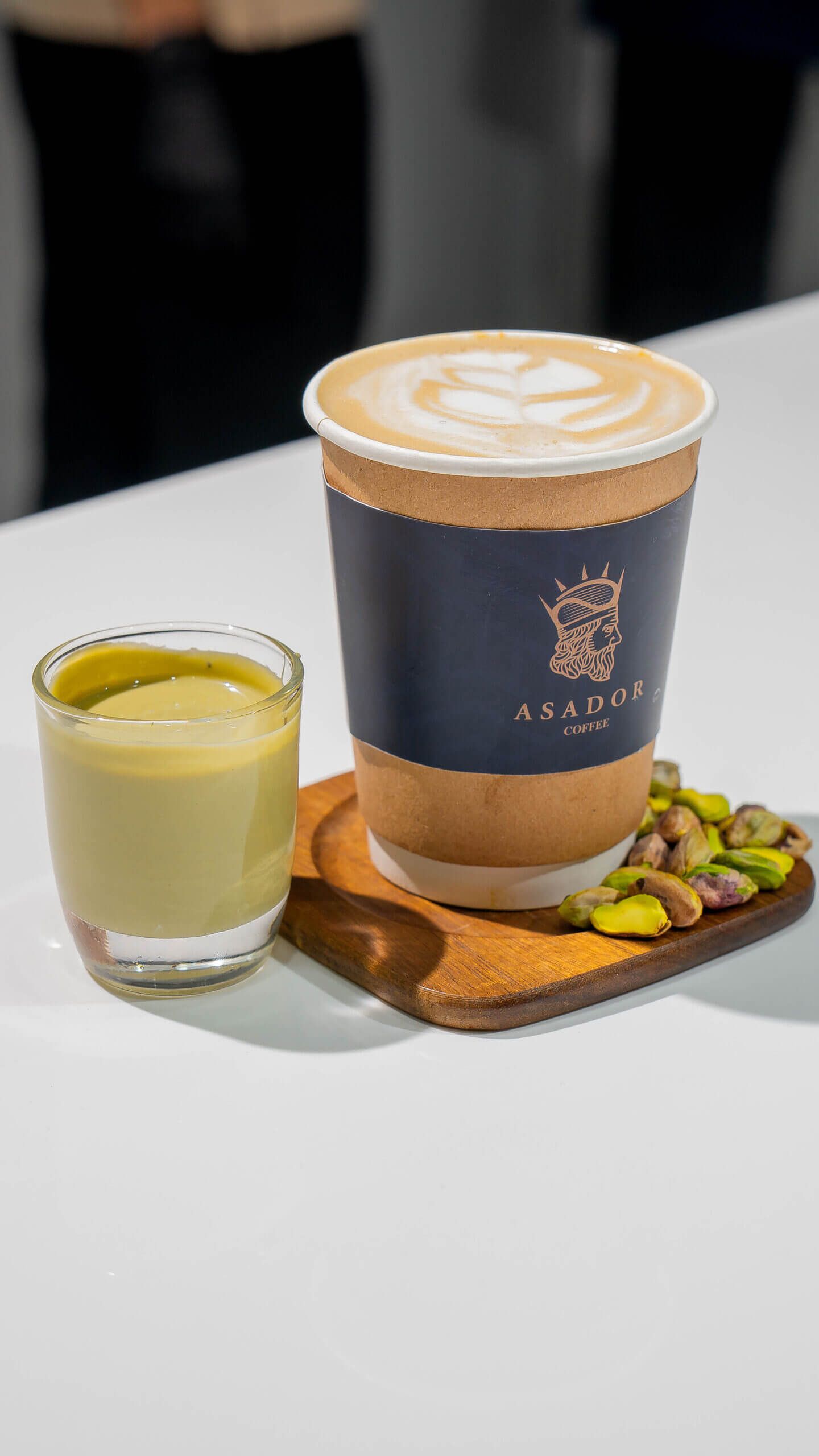 Hot Pistachio Latte with Latte Art and Real Pistachio Sauce at Asador Coffee El Jadida