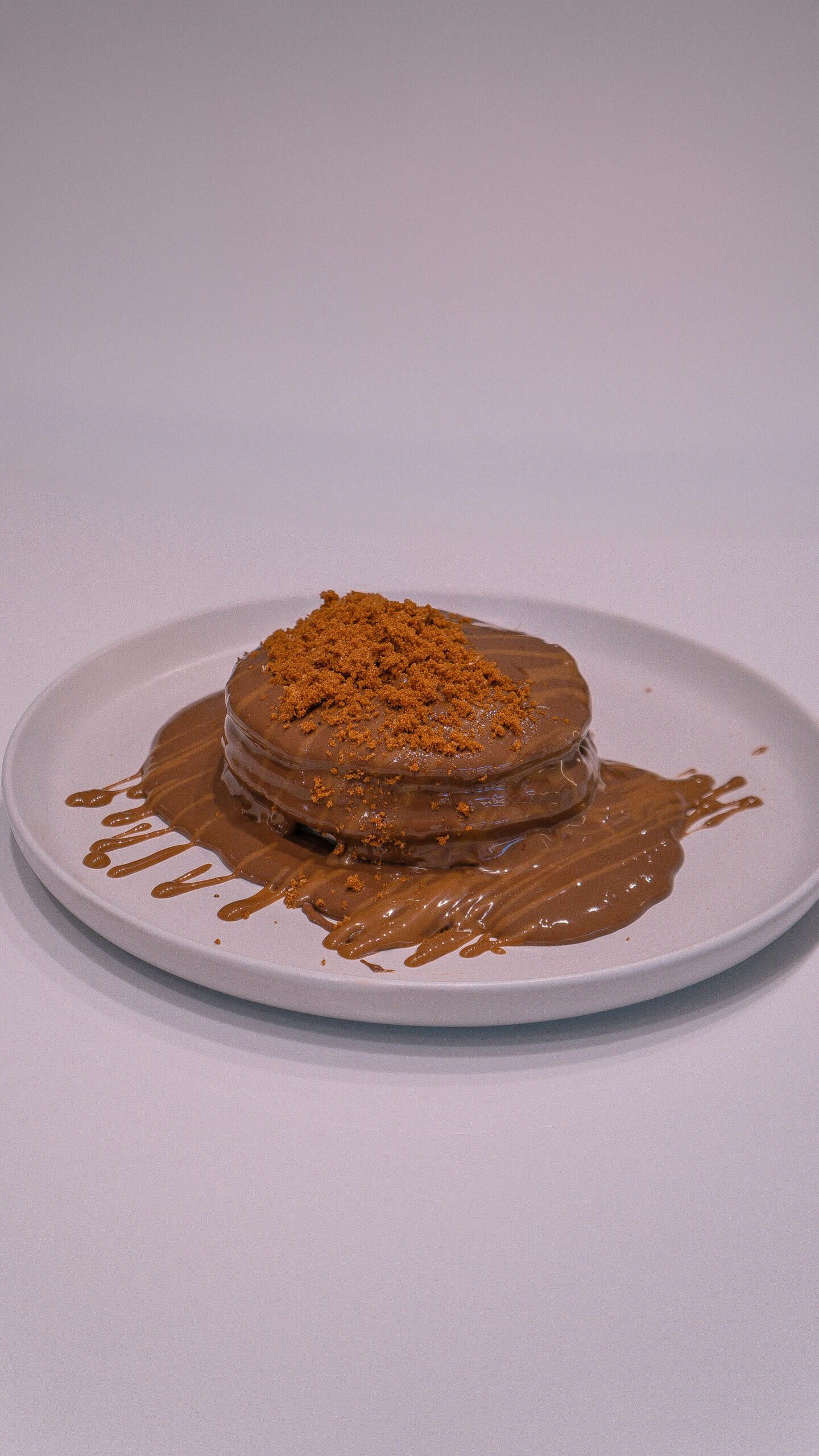 Stack of Fluffy Lotus Pancakes with Biscoff Spread and Cream Cheese at Asador Coffee El Jadida