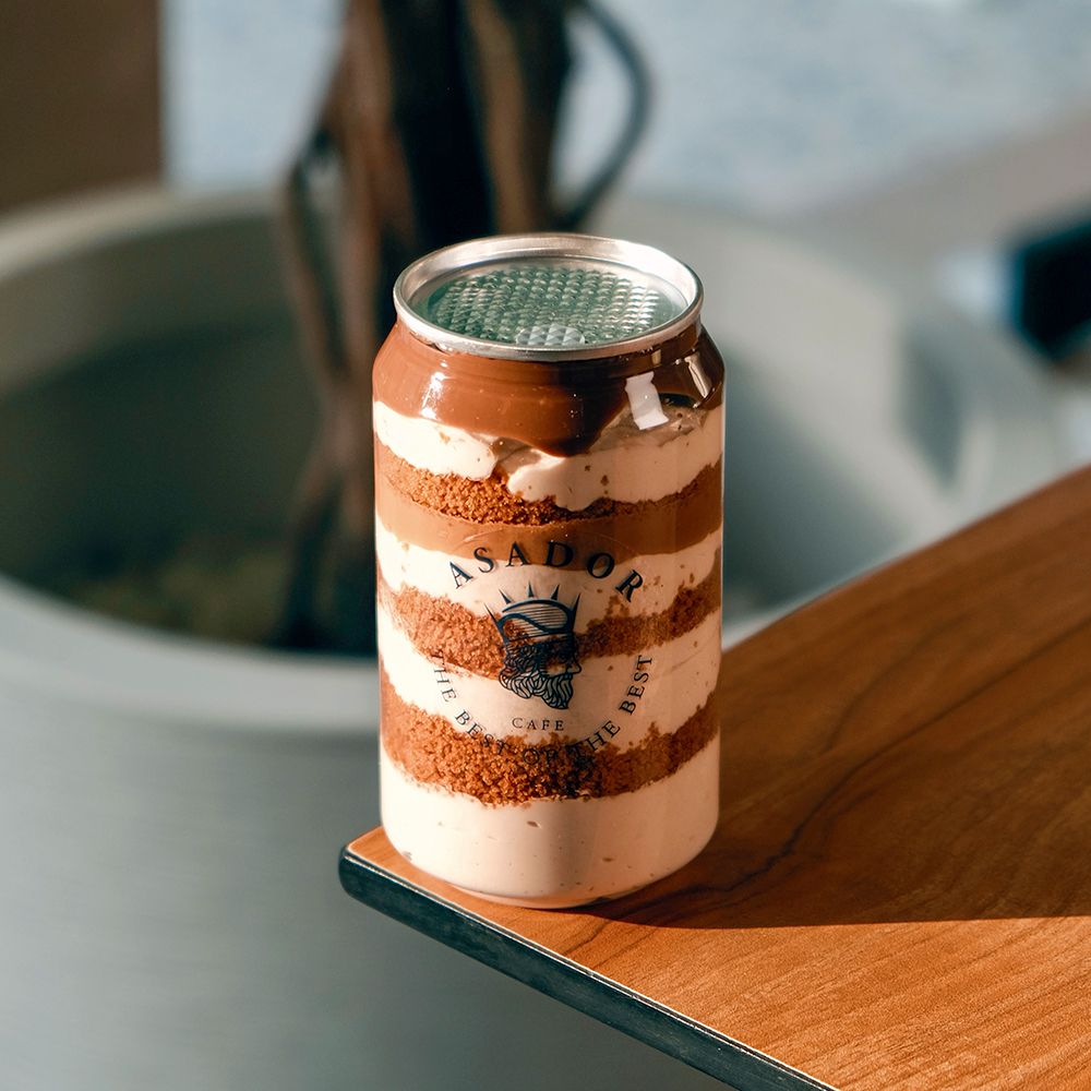 Layered Lotus Biscoff Cake Dessert in Clear Pop-Top Can at Asador Coffee El Jadida