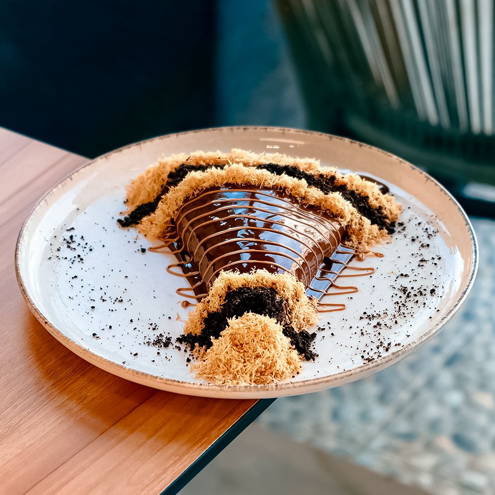 Fusion Crepe Kunafa Cappuccino with Cream Cheese Filling and Crispy Pastry Topping at Asador Coffee El Jadida