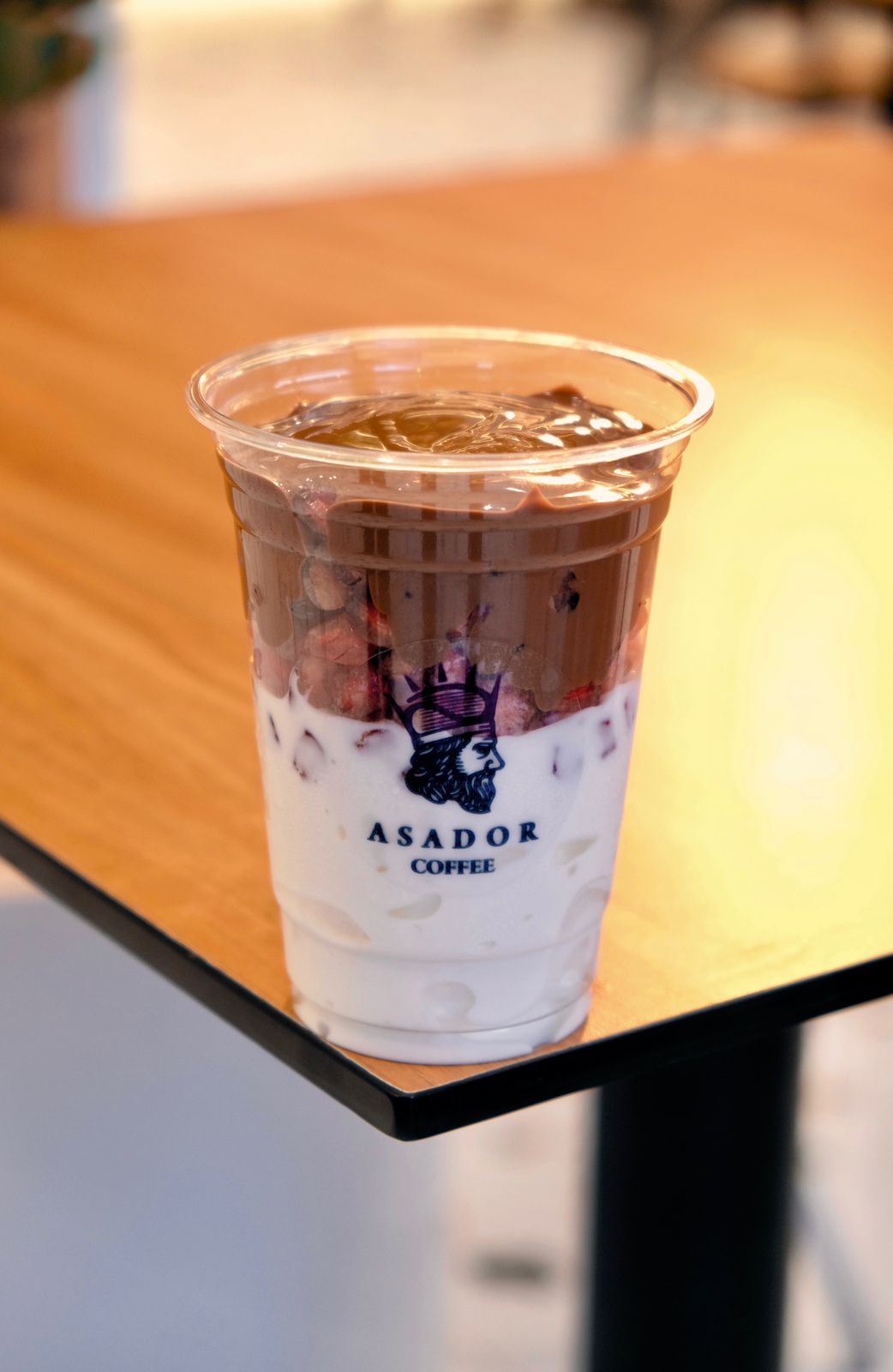 Ruby Cream Ice Cream Drink with Grenadine and Chocolate in Plastic Cup at Asador Coffee El Jadida