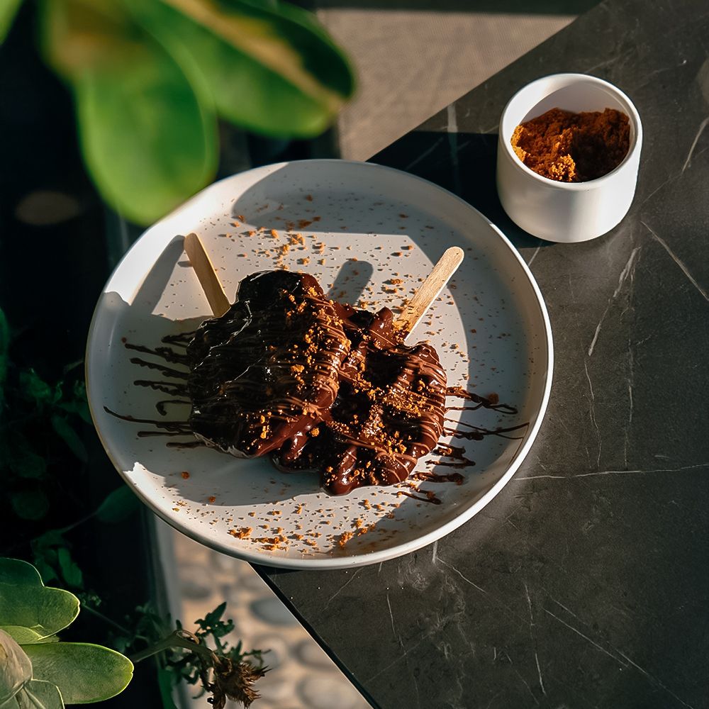 Fresh Dark Waffle Sticks with Intense Dark Chocolate Drizzle at Asador Coffee El Jadida