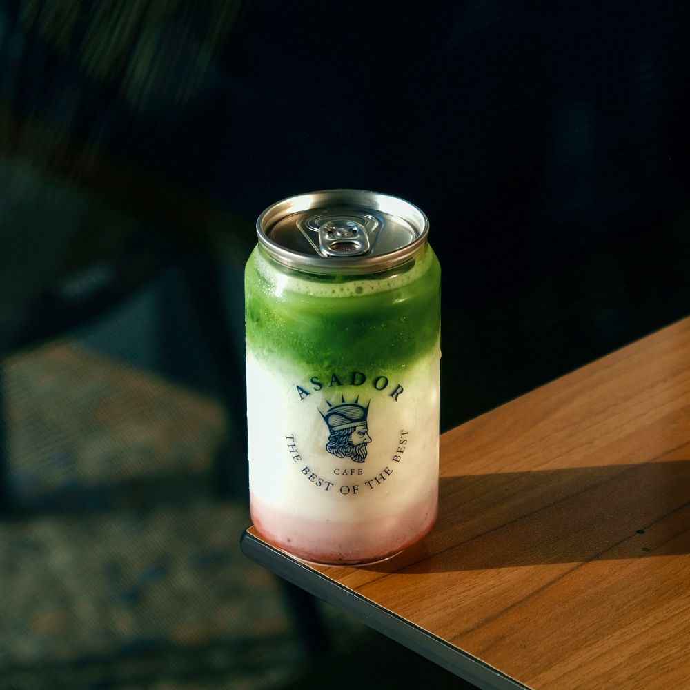 Layered Strawberry Creamy Matcha in Clear Pop-Top Can at Asador Coffee El Jadida