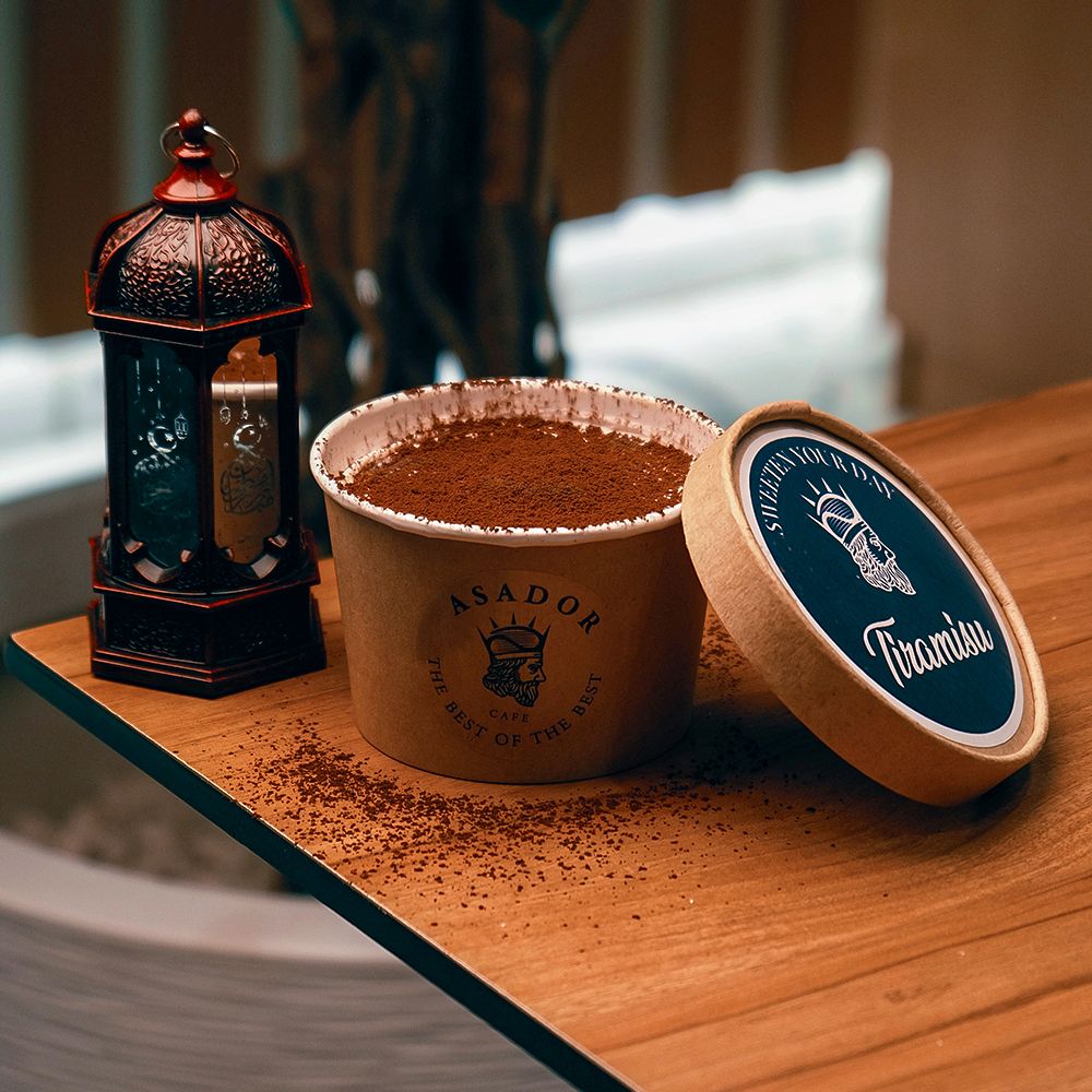 Classic Tiramisu Dessert Cup Dusted with Cocoa Powder at Asador Coffee El Jadida