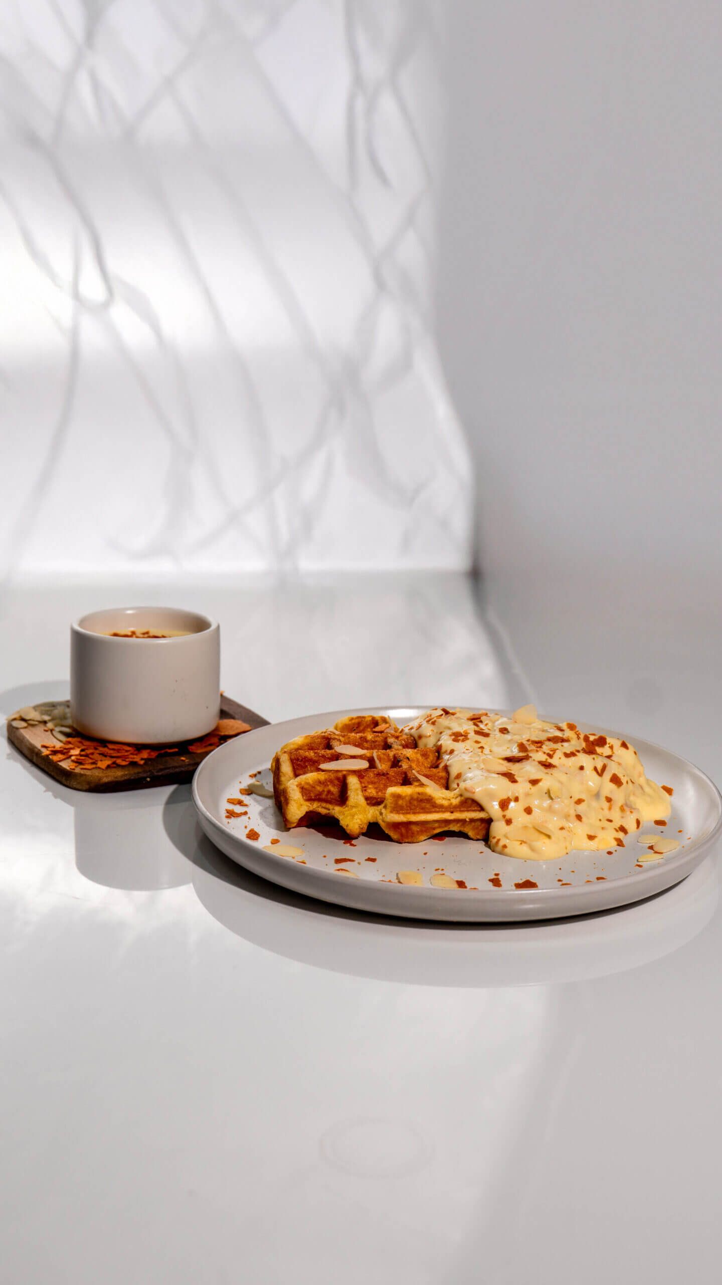Freshly Baked Raffaello Waffle with White Chocolate and Coconut Cream at Asador Coffee El Jadida