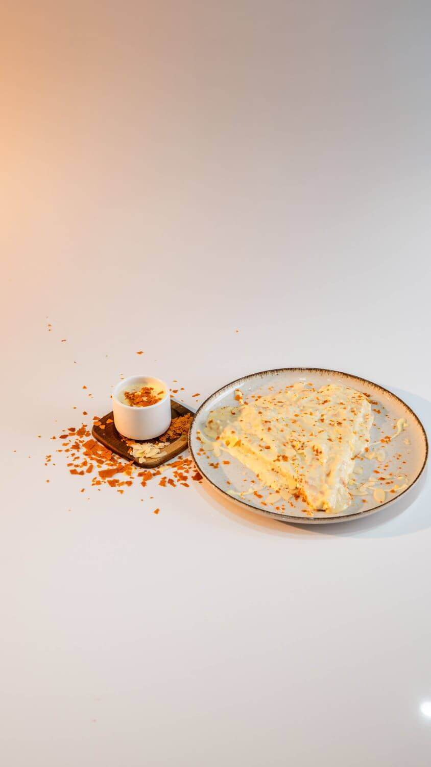 Folded Crepe Raffaello Crispy with Feuilletine Flakes and Coconut White Chocolate Garnish at Asador Coffee El Jadida