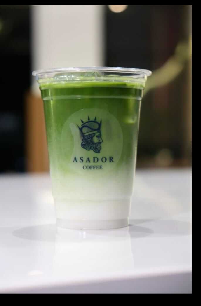 Signature Iced Asador Matcha Latte with Ice Cream in Plastic Cup at Asador Coffee El Jadida