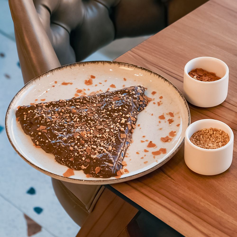 Folded Crepe Crunchy Rocher with Hazelnut Spread and Crispy Feuilletine at Asador Coffee El Jadida