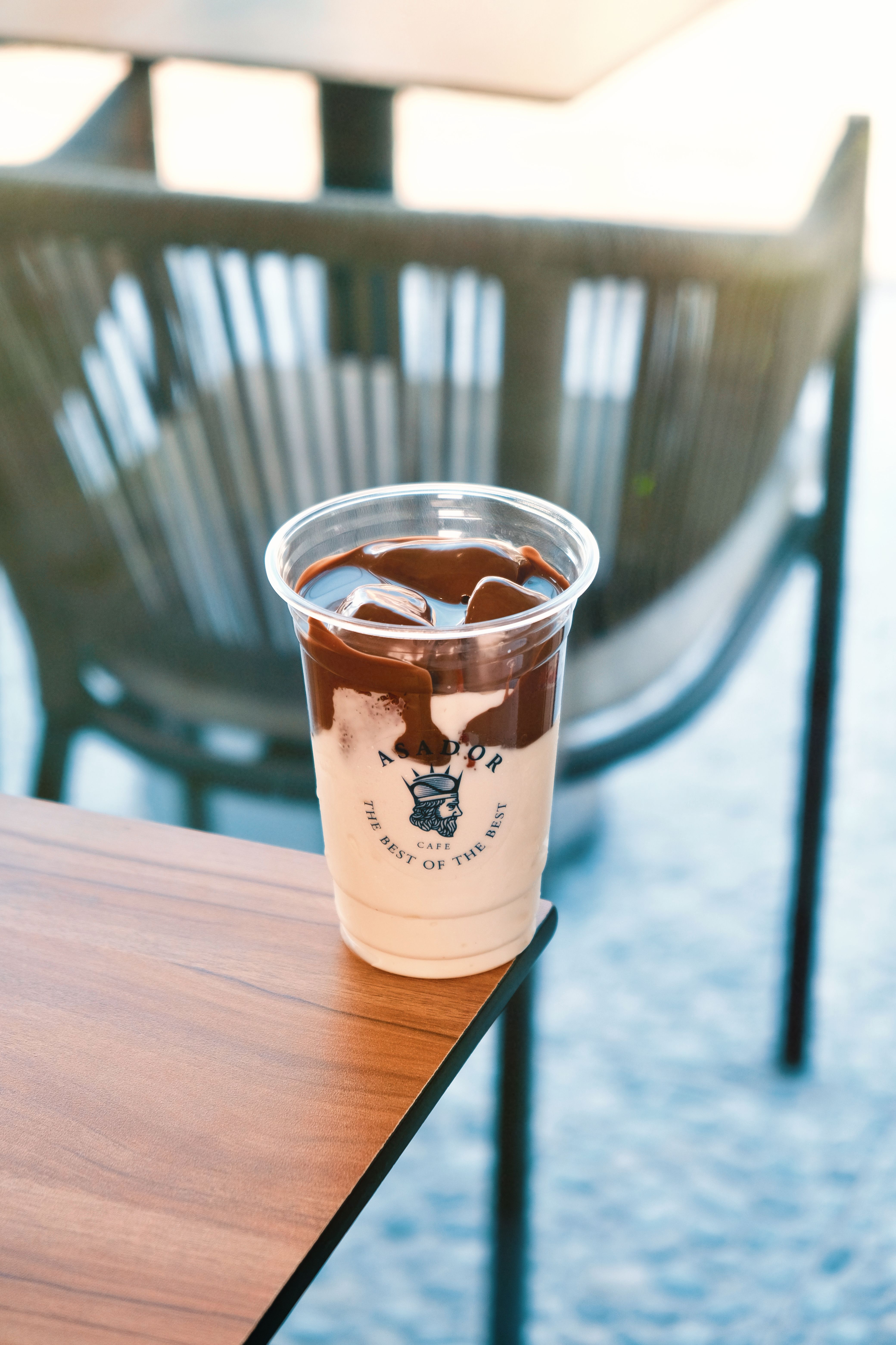 Layered Cold Drink with Strawberry Ice Cream Base and Dark Chocolate Topping over Ice at Asador Coffee El Jadida