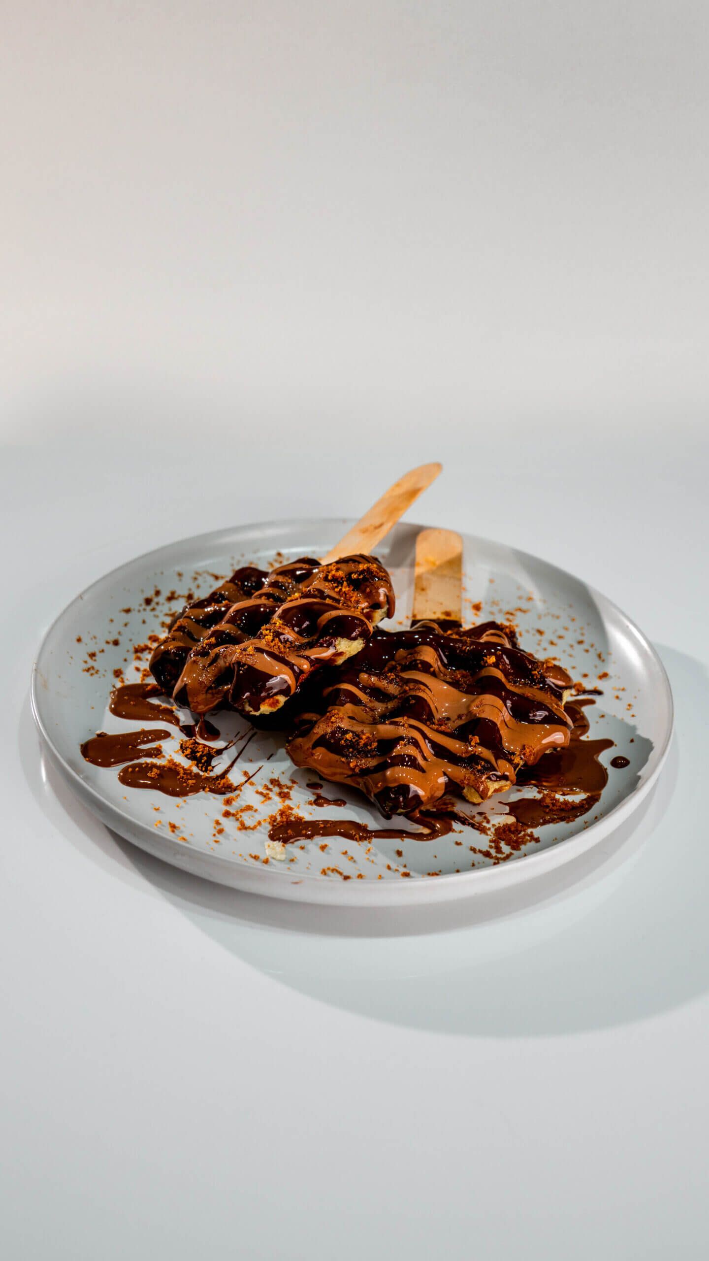 Fresh Milk Waffle Sticks with Creamy Milk Chocolate Drizzle at Asador Coffee El Jadida