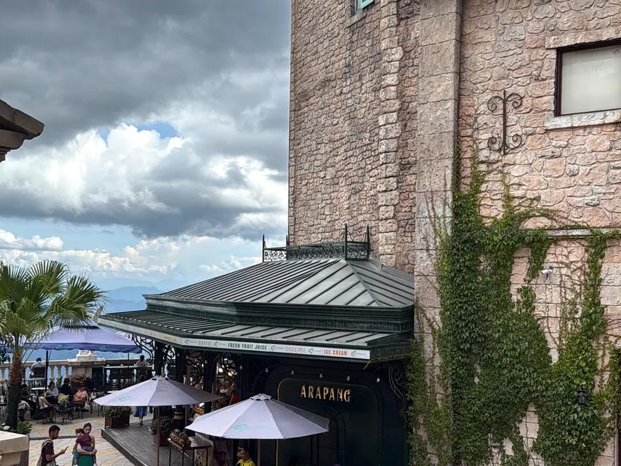 Stone buildings and a café terrace in the French Village at Ba Na Hills