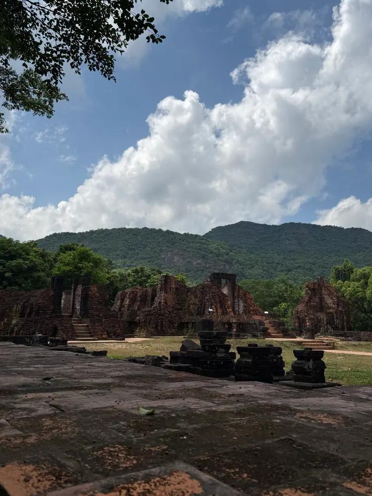 The My Son temple groups spread across the valley floor below forested mountains