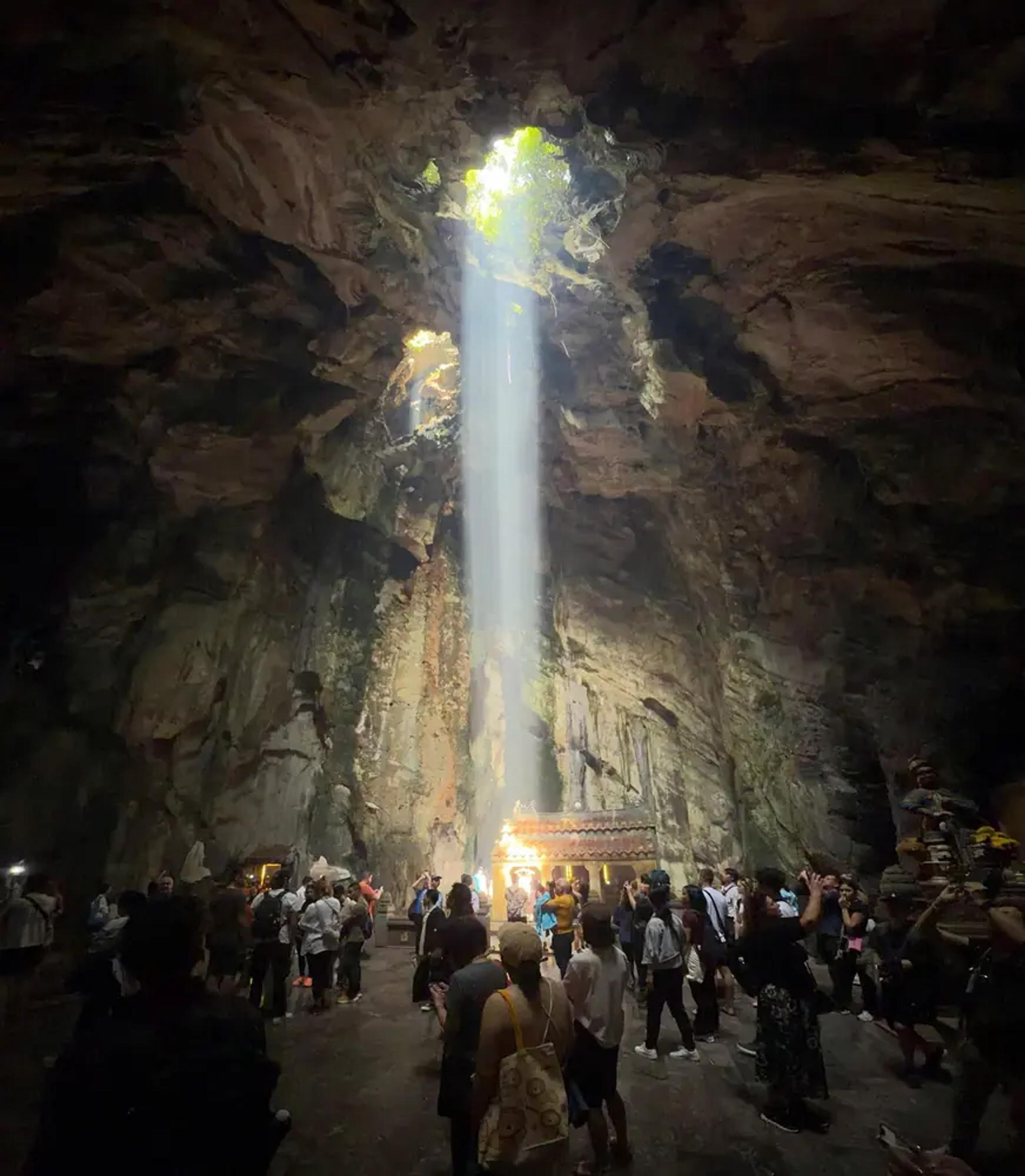A shaft of daylight falling into Huyen Khong Cave inside the Marble Mountains