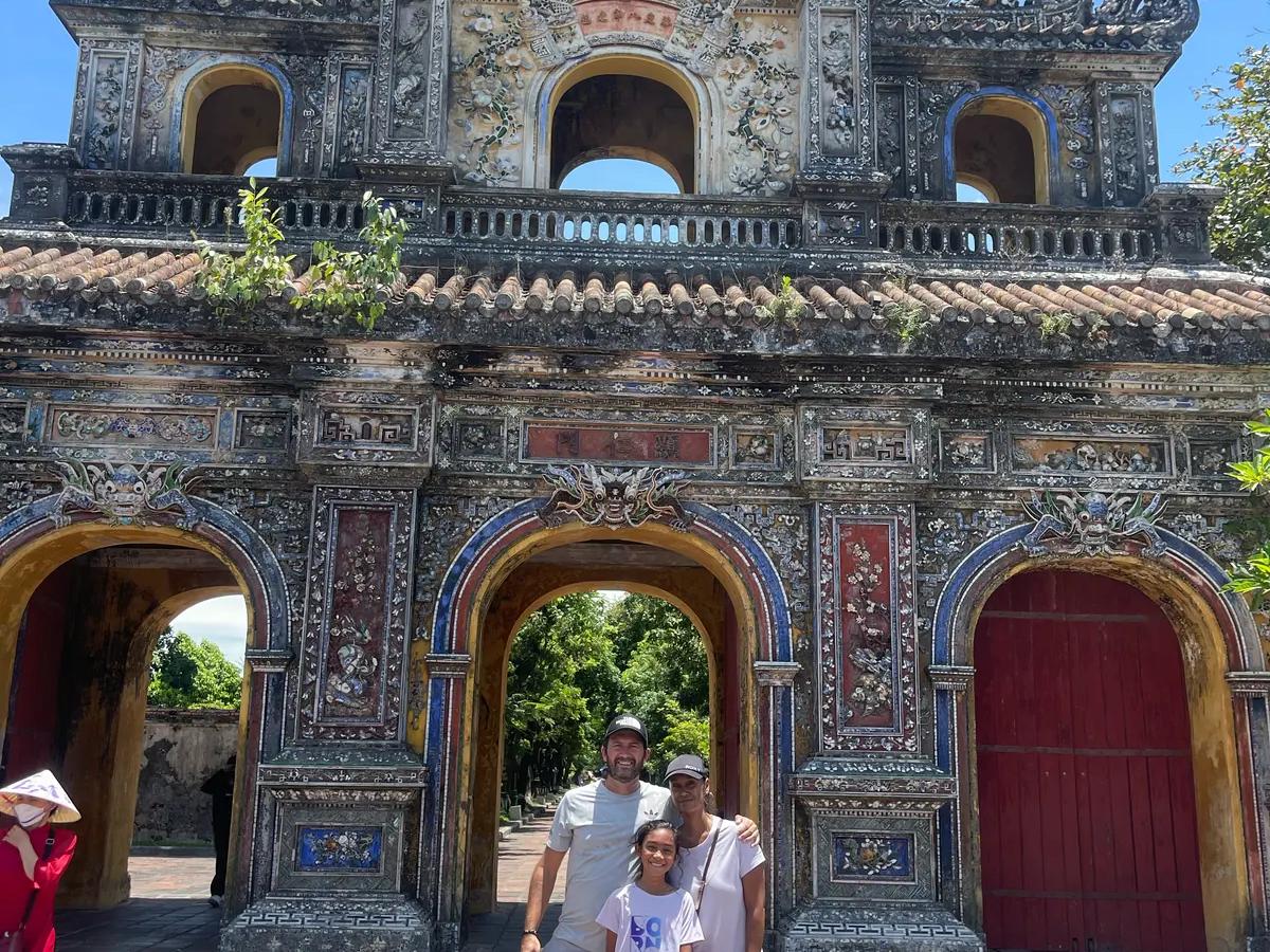Guests at one of the decorated gates of the Hue Imperial Citadel