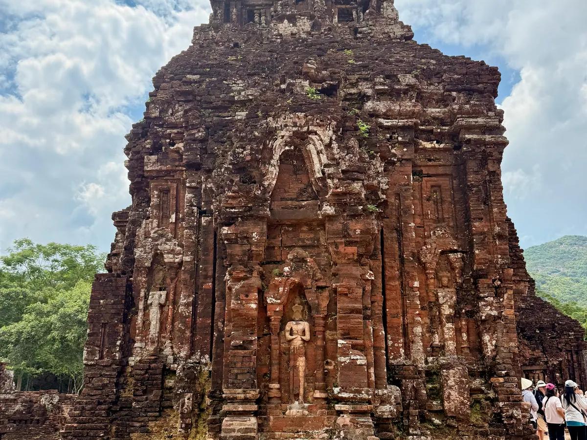 A Champa brick tower standing in the My Son Sanctuary valley