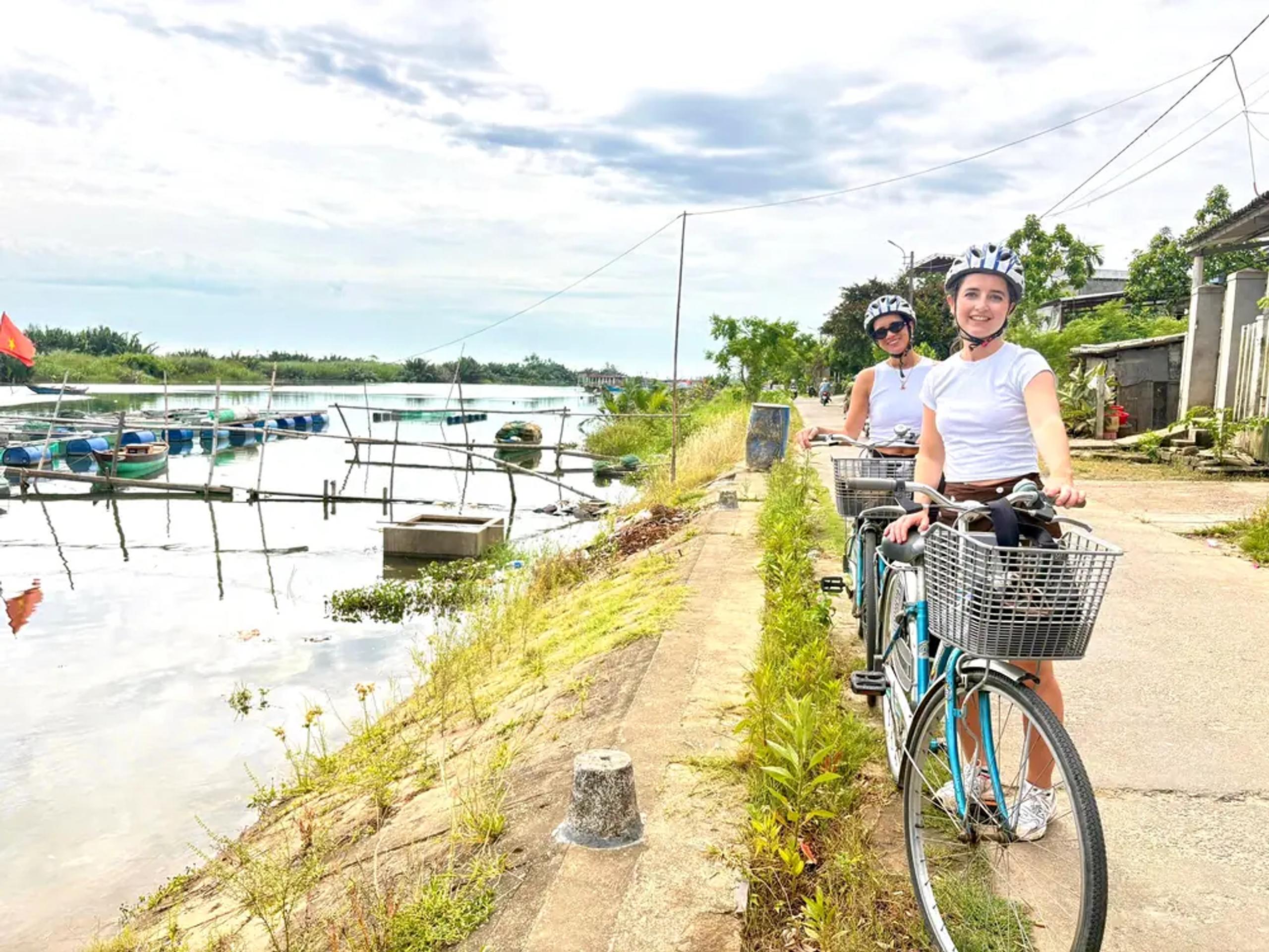 Cycling back to Hoi An along a river path at the end of the countryside tour