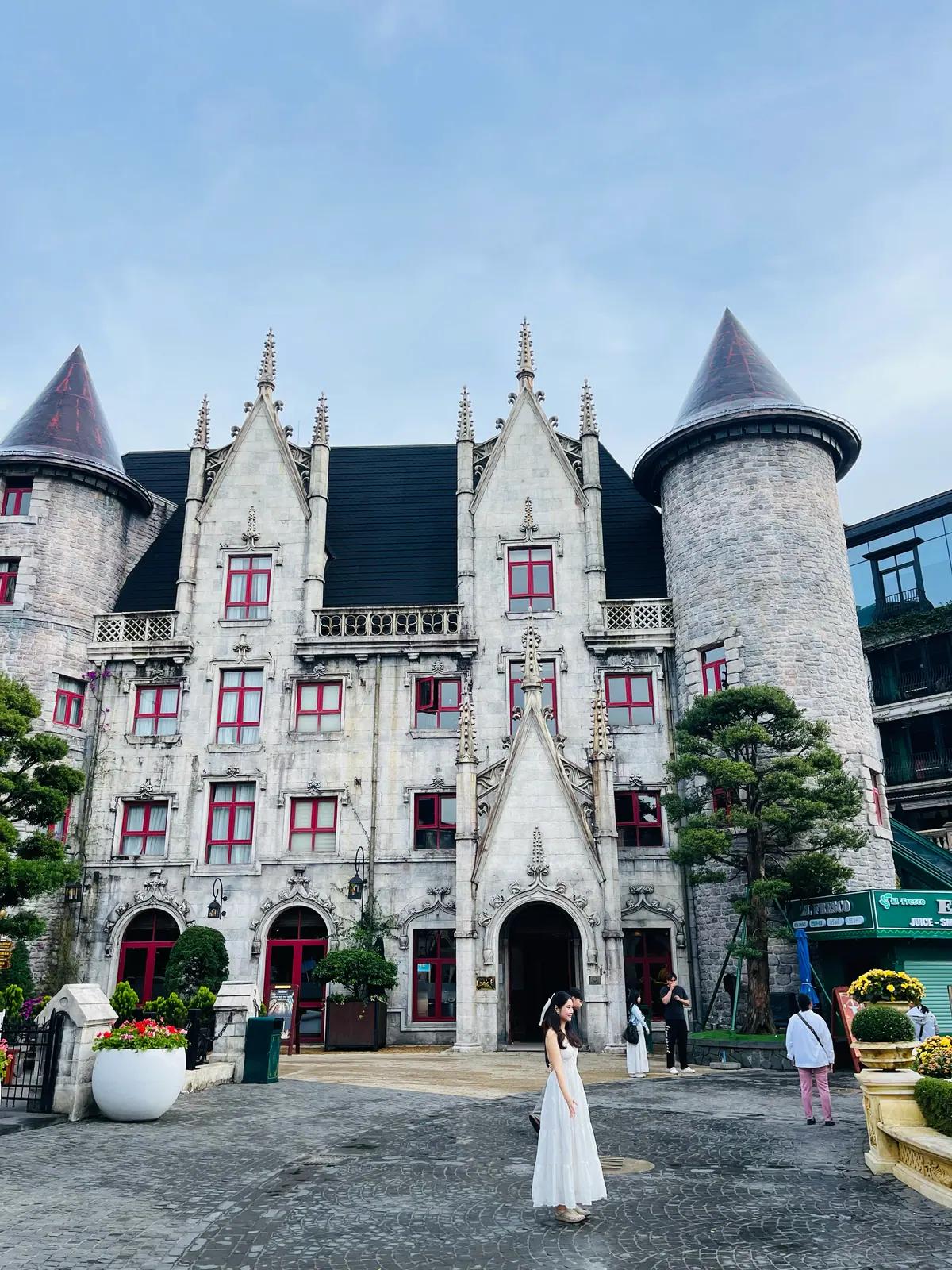 The white castle-style building with pointed towers in the French Village
