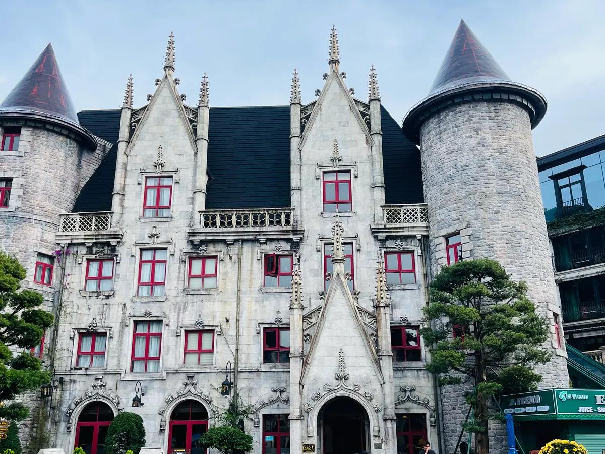 The white castle-style building with pointed towers in the French Village