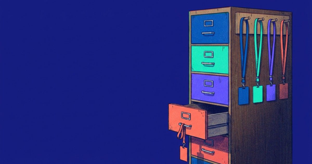 Colour-coded filing cabinet drawers with matching staff badges: role-based access to therapy notes and records