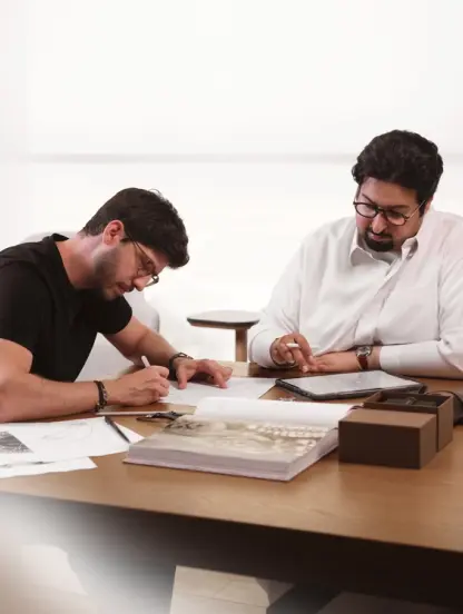 Andrea Furlan and Hamad Al Marri sketching