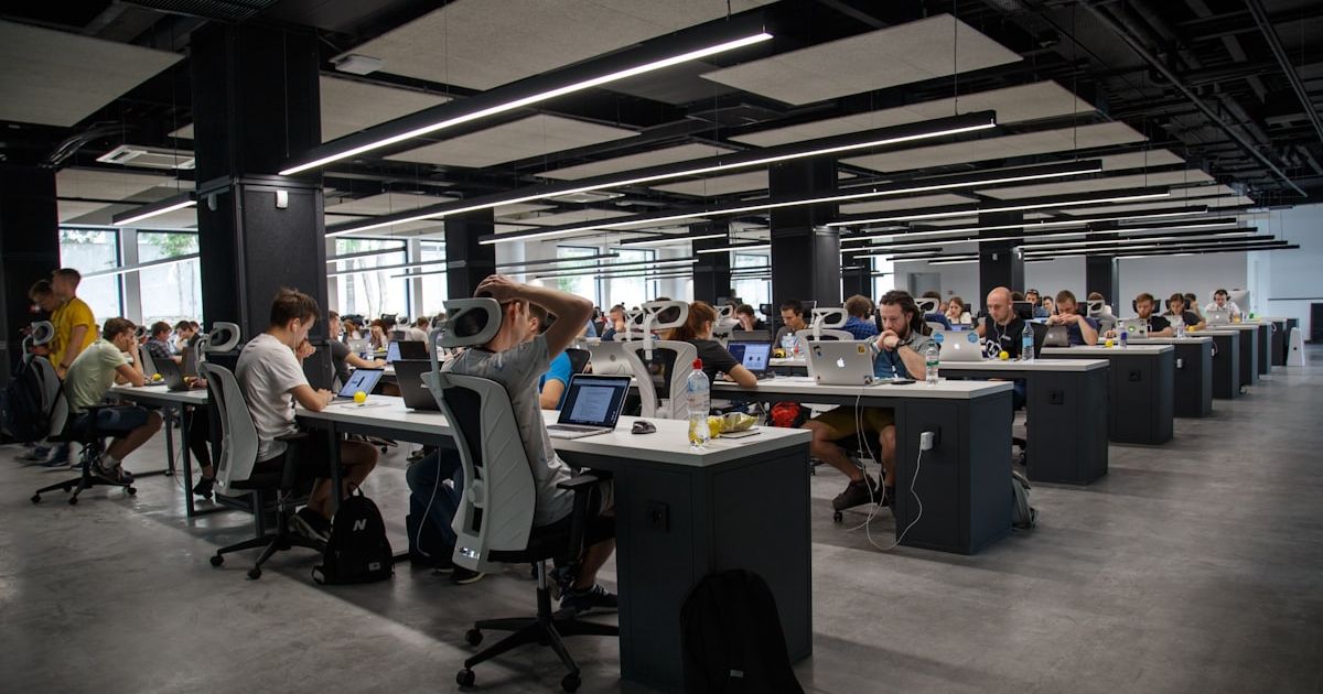 Modern startup workspace with multiple monitors