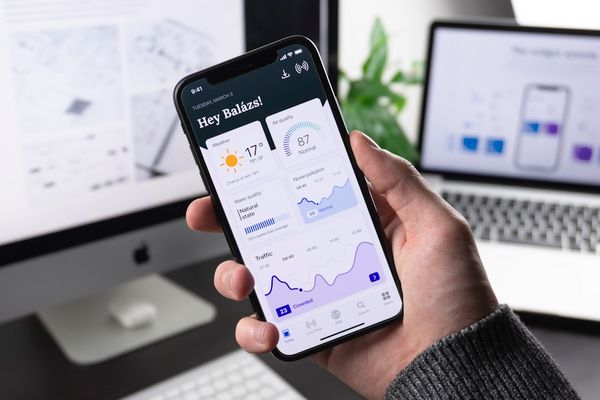 Person using laptop with accessibility features