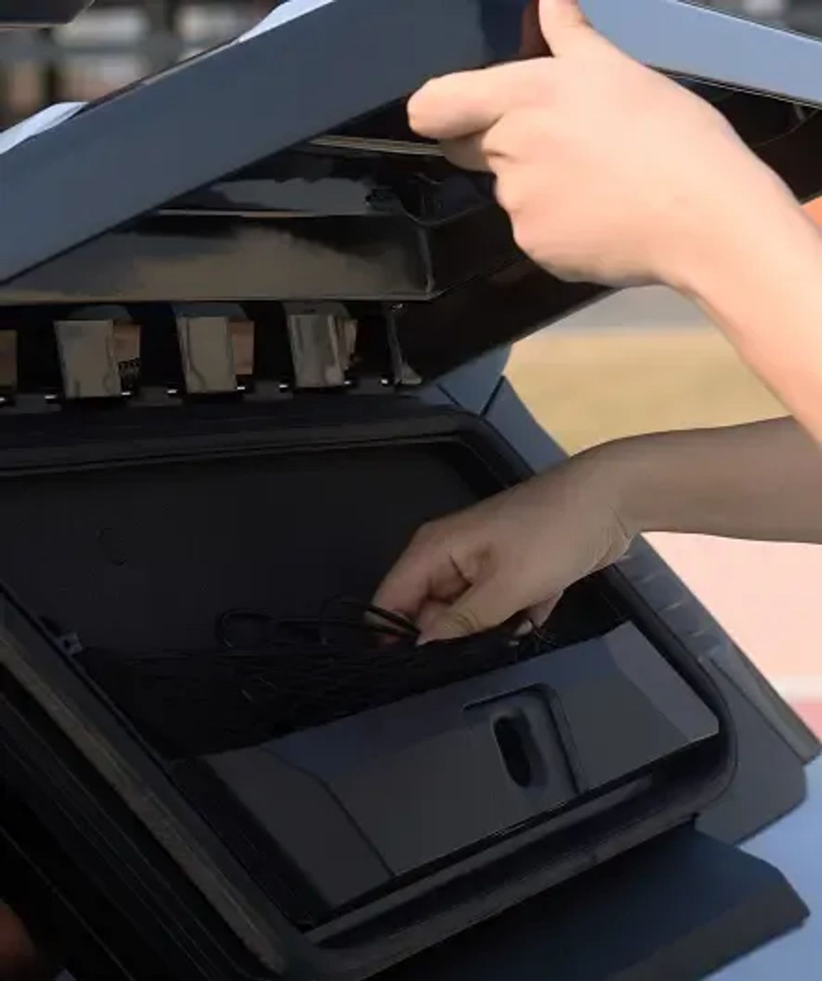 Adventure Pack side tool kit being opened on the vehicle